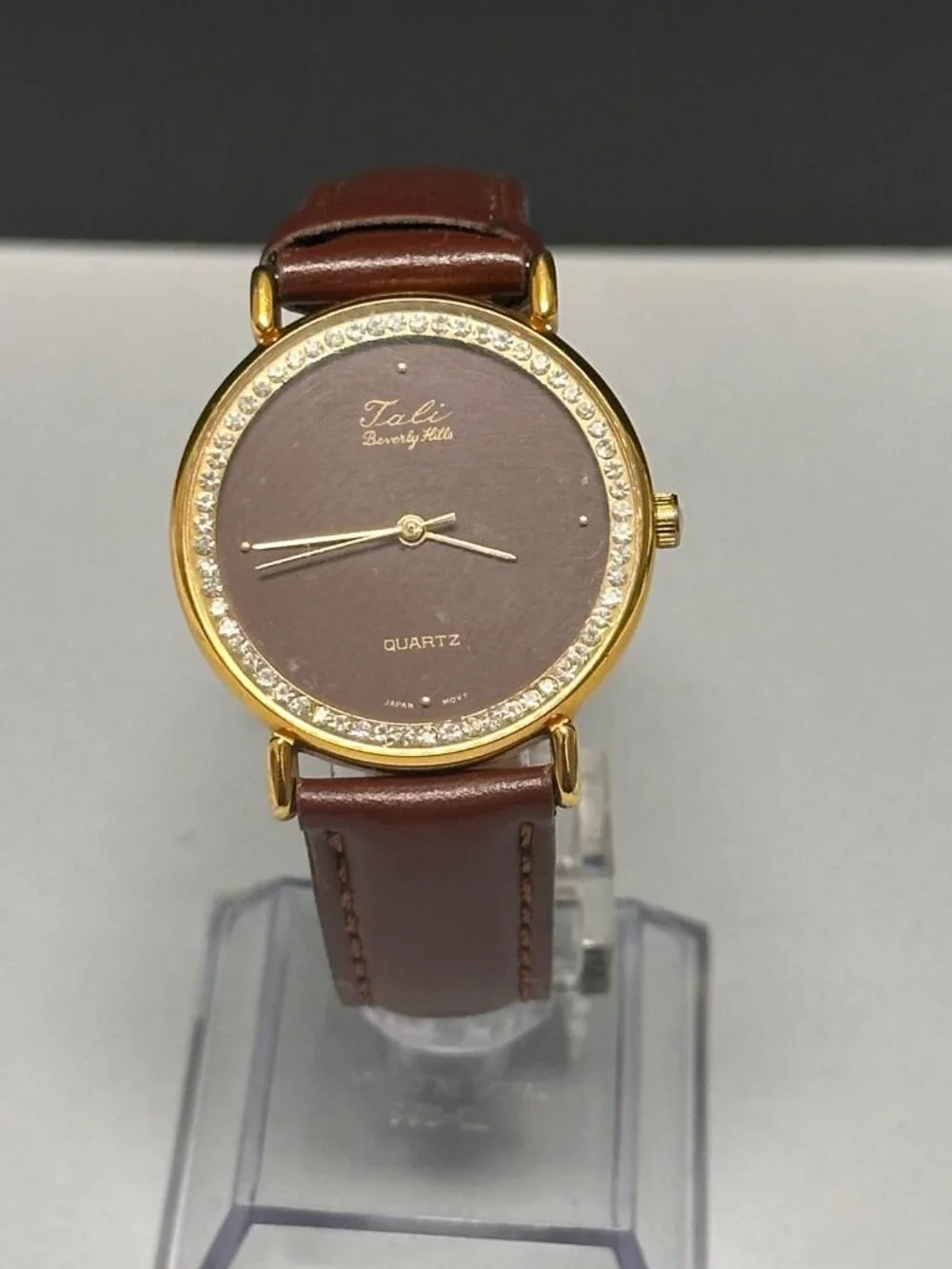 VTG. Tali Bevelry Hills Watch Women Gold Tone Brown Dial Leather Band 9